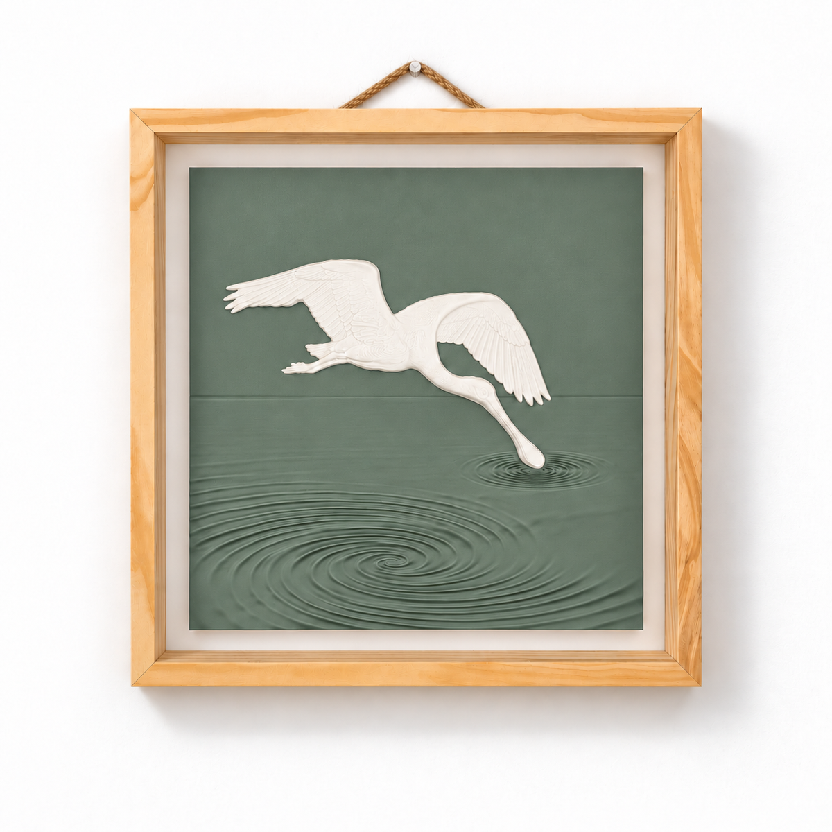 Front view of white spoonbill wall art above sculpted Sage water ripples in a natural wood frame — Sage panel